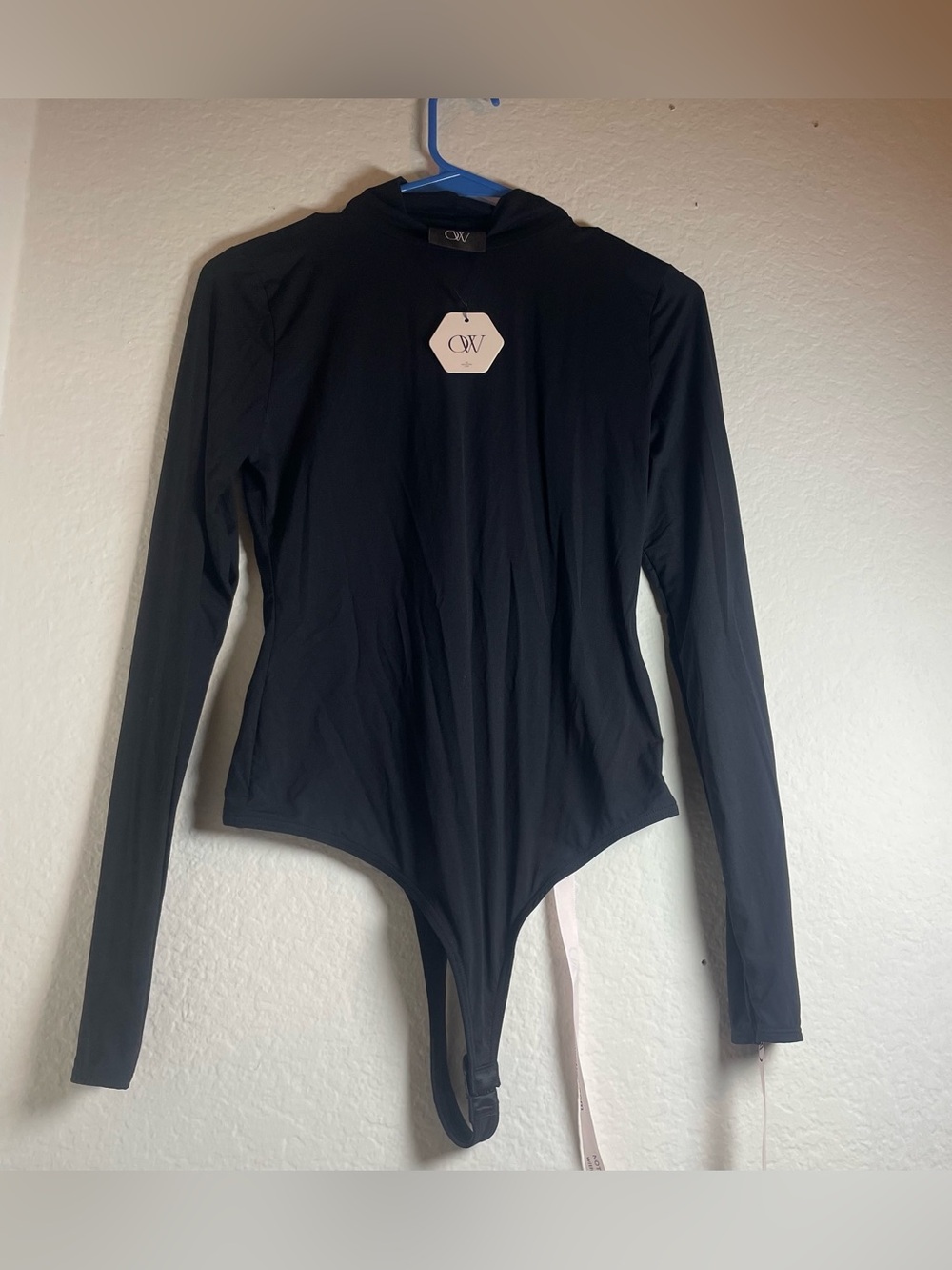 OW Collection Black Solid Turtleneck
Long Sleeve One Piece Bodysuit S
Women
